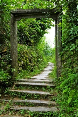 Stone entry gate on footpath to Zhuang village.