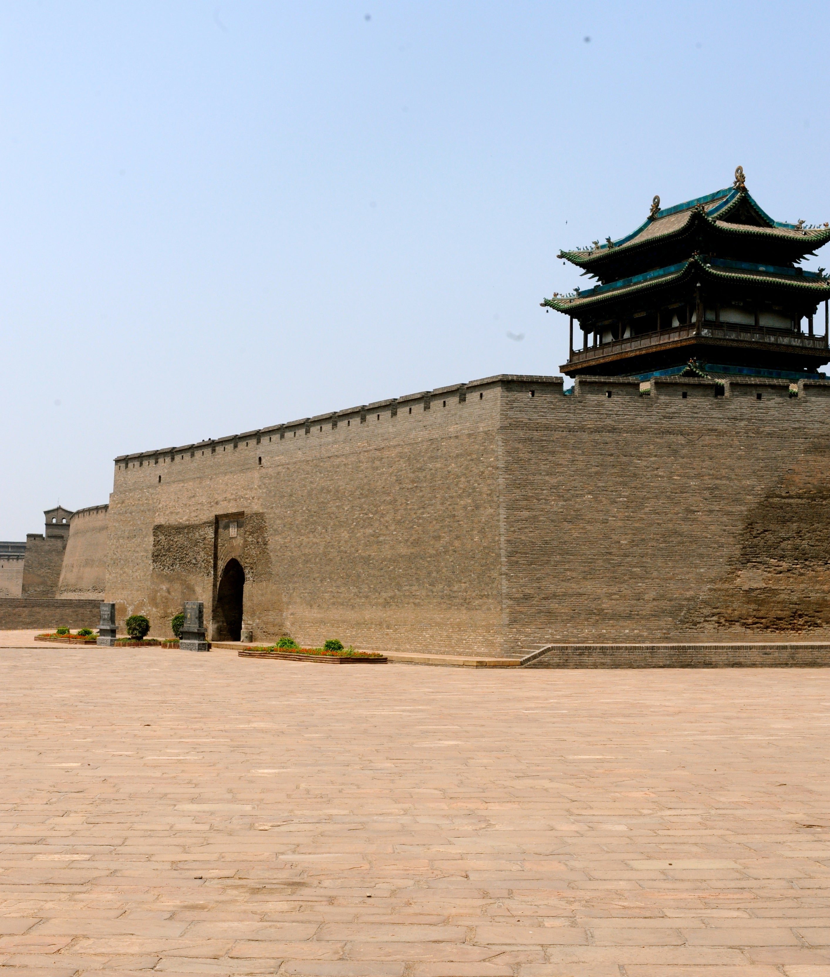 South gate is even more foreboding than the north gate with huge blank walls.