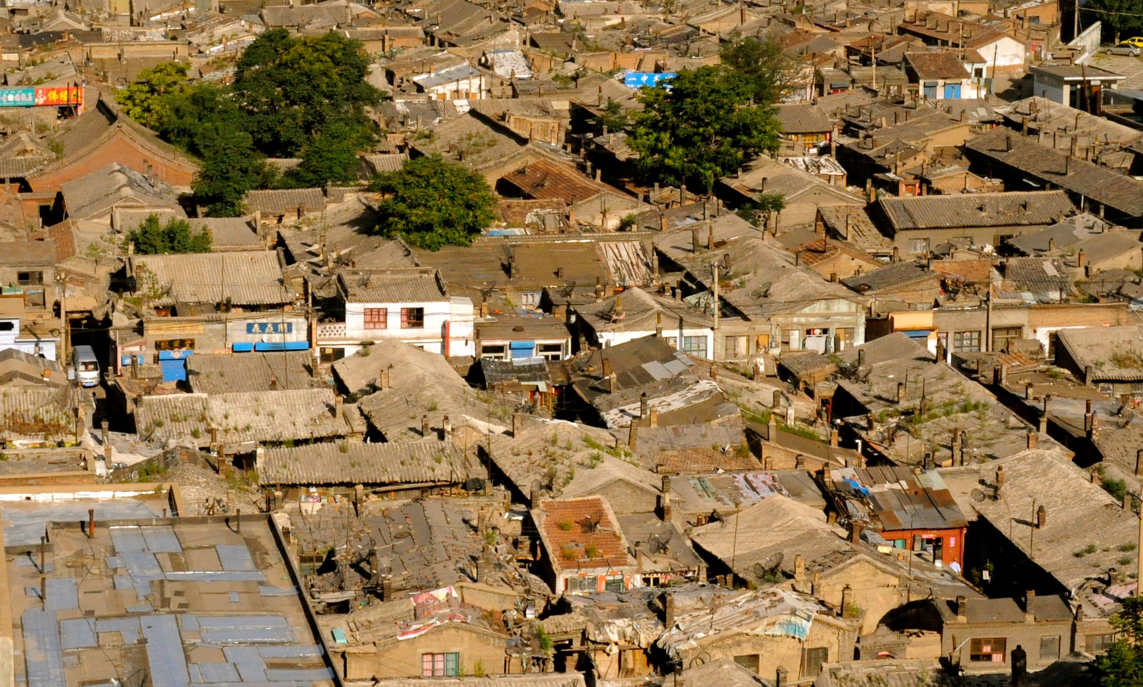 Old fabric of single story courtyard houses.  At ground level this is a dismal place to live.