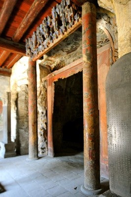 Gateways mix wood and carved-out stone.