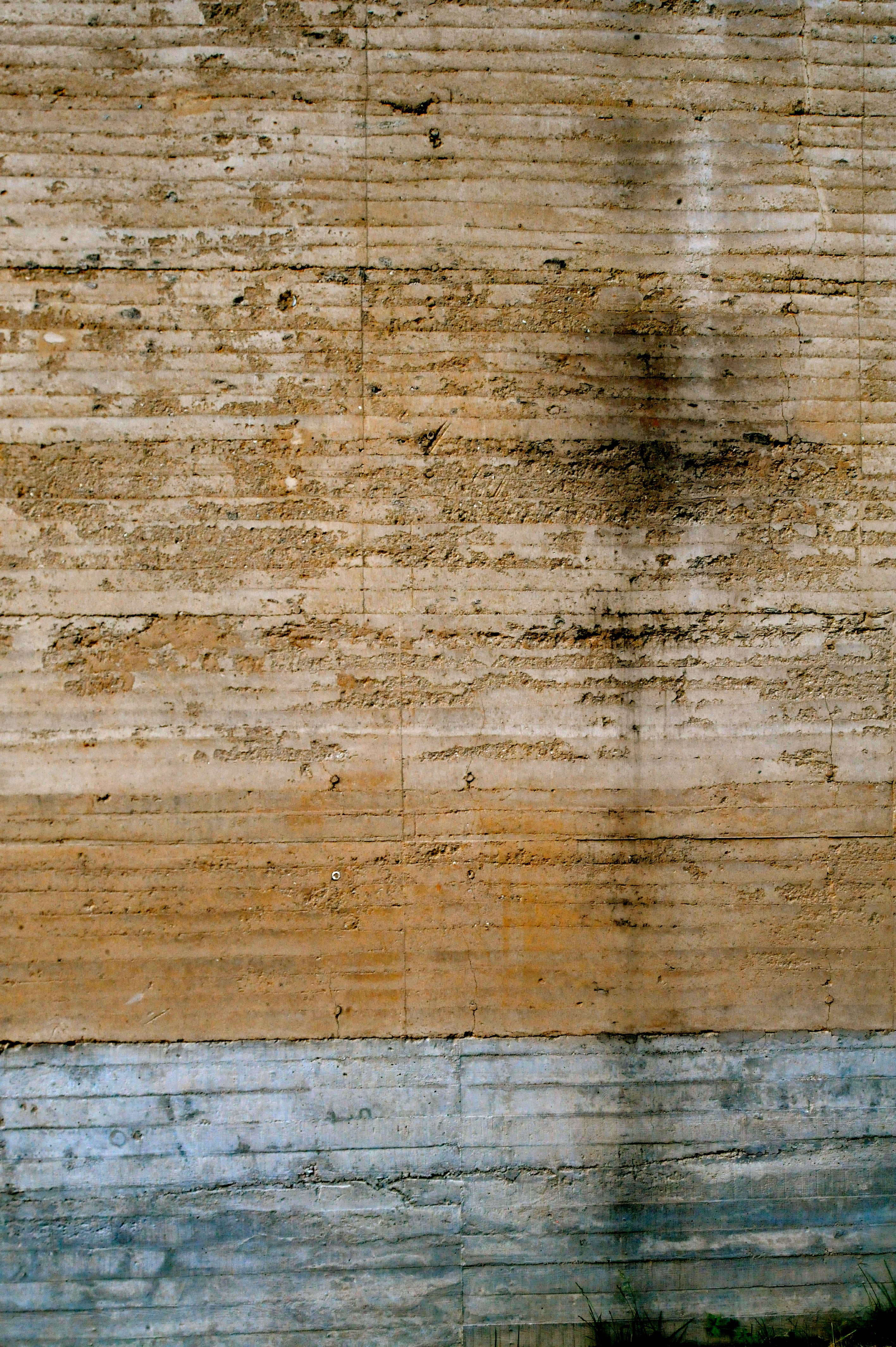 Rammed earth wall in Split House
