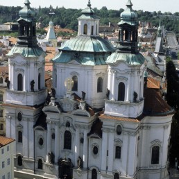 Saint Nicholas Church at the Old Town Square in Prague, Czechia by architects Antonín Braun, Bernardo Spinetti, Peter Adam the Elder