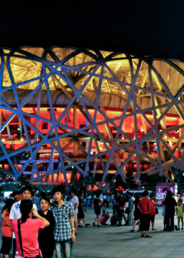 EXTERIOR EVENING NIGHT LIGHTS RED ORANGE GLOW Herzog de Meuron Beijing National Stadium Bird's Nest