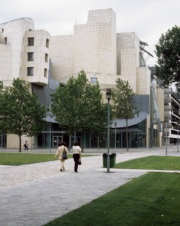 Frank Gehry American Center in Paris now home to the Cinémathèque Française, by architect Frank Gehry, photographed by Larry Speck of University of Texas at Austin School of Architecture UTSOA. Cloudy day.