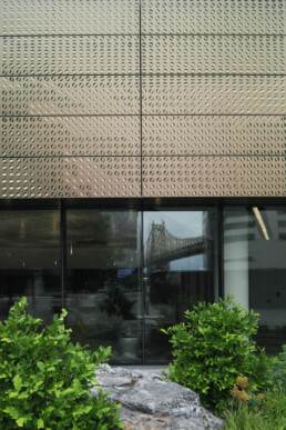 Morphosis Architecture Cornell Tech Campus Emma and Georgina Bloomberg Center Roosevelt Island NYC Futuristic Architecture Perforated Iridescent Metal Facade Panels